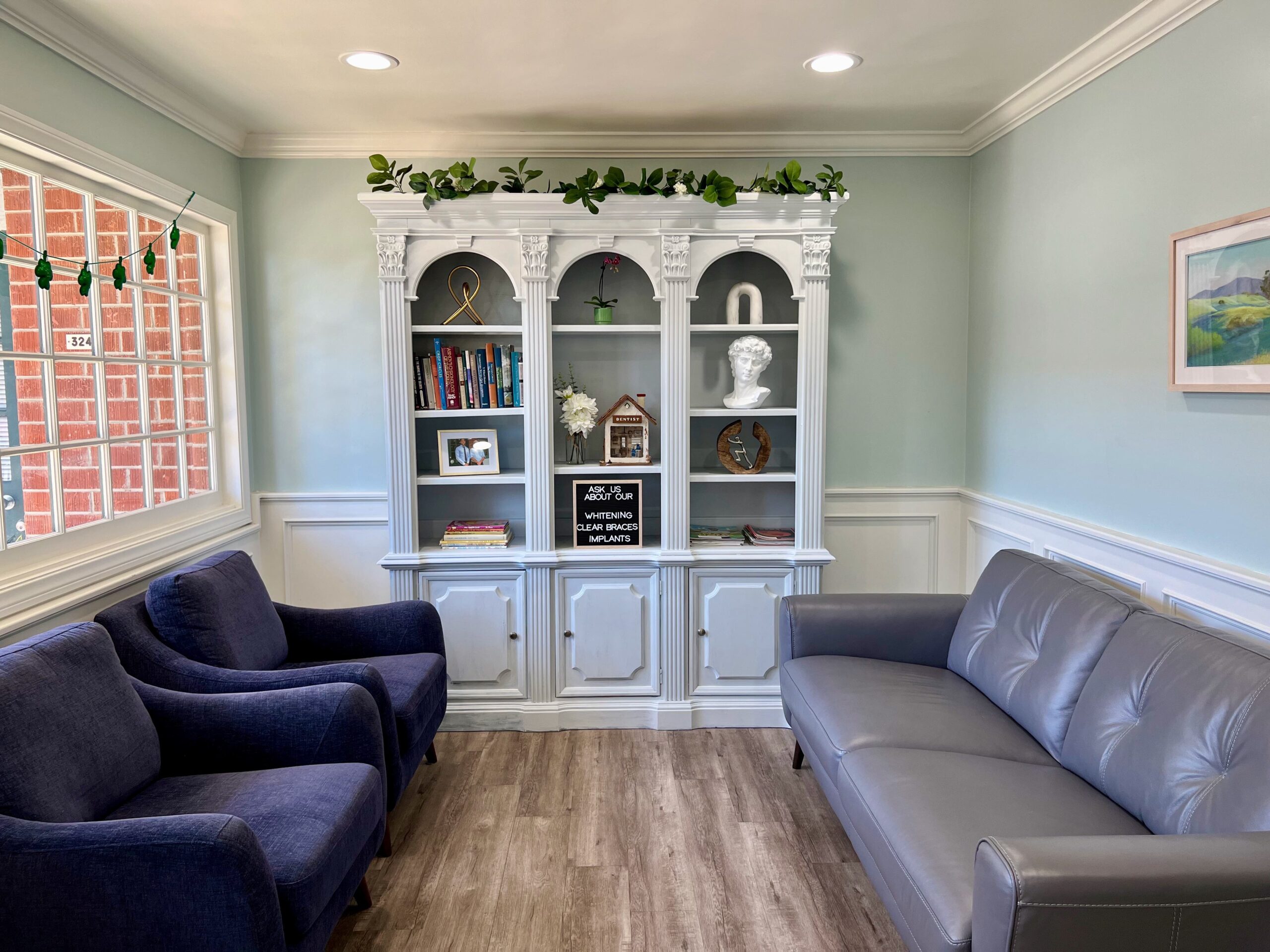 office with two couches and bookcase